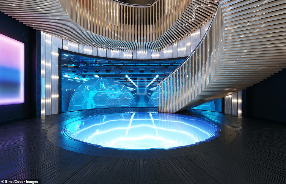 A huge staircase at the centre of the vessel spirals around a water feature (centre) to the lower level, where the ship's hydrogen fuel tanks can be viewed through a glass panel (rear). Each tank weighs 28 tons, is vacuum sealed and cooled to -423F (-253C) in order to hold the hydrogen fuel