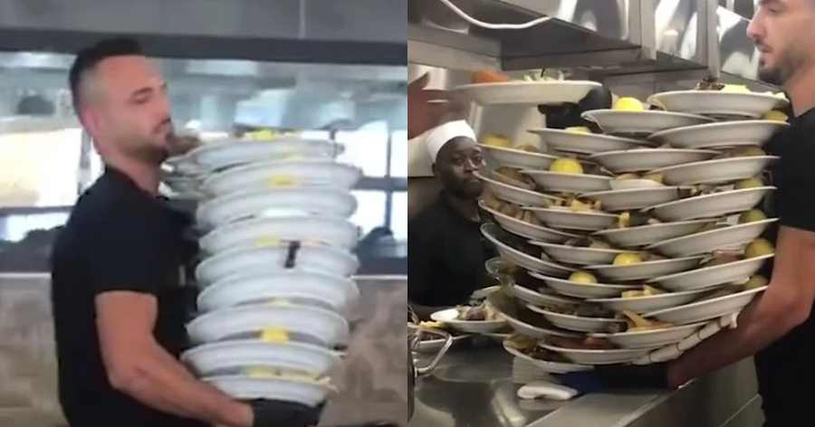 Μας έχει αφήσει με το στόμα ανοιχτό: Viral σερβιτόρος κουβαλάει 33 πιάτα γεμάτα φαγητό με τη μία