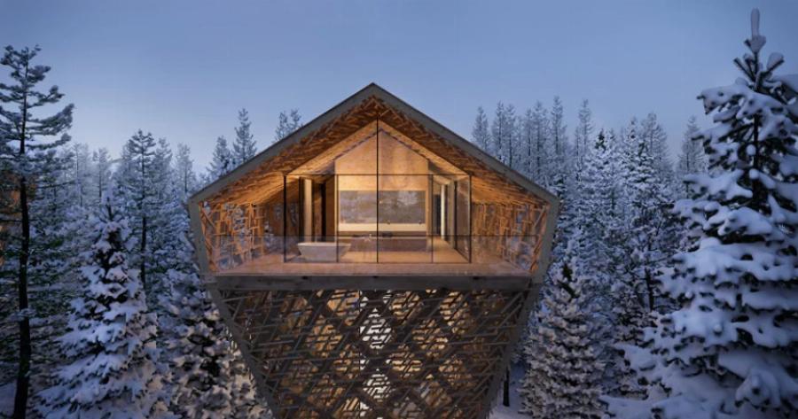 Χαλαρώνοντας στις ξύλινες σουίτες της Αυστρίας στη μέση ενός κατάλευκου, χιονισμένου δάσους
