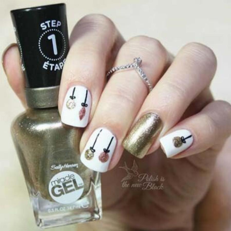 Υπέροχα γιορτινά σχέδια στα νύχια για τα Χριστούγεννα για να πάρετε ιδέες