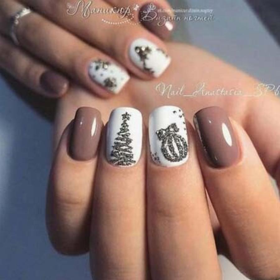 Υπέροχα γιορτινά σχέδια στα νύχια για τα Χριστούγεννα για να πάρετε ιδέες