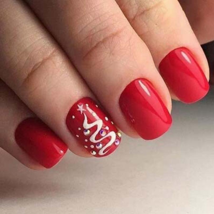 Υπέροχα γιορτινά σχέδια στα νύχια για τα Χριστούγεννα για να πάρετε ιδέες