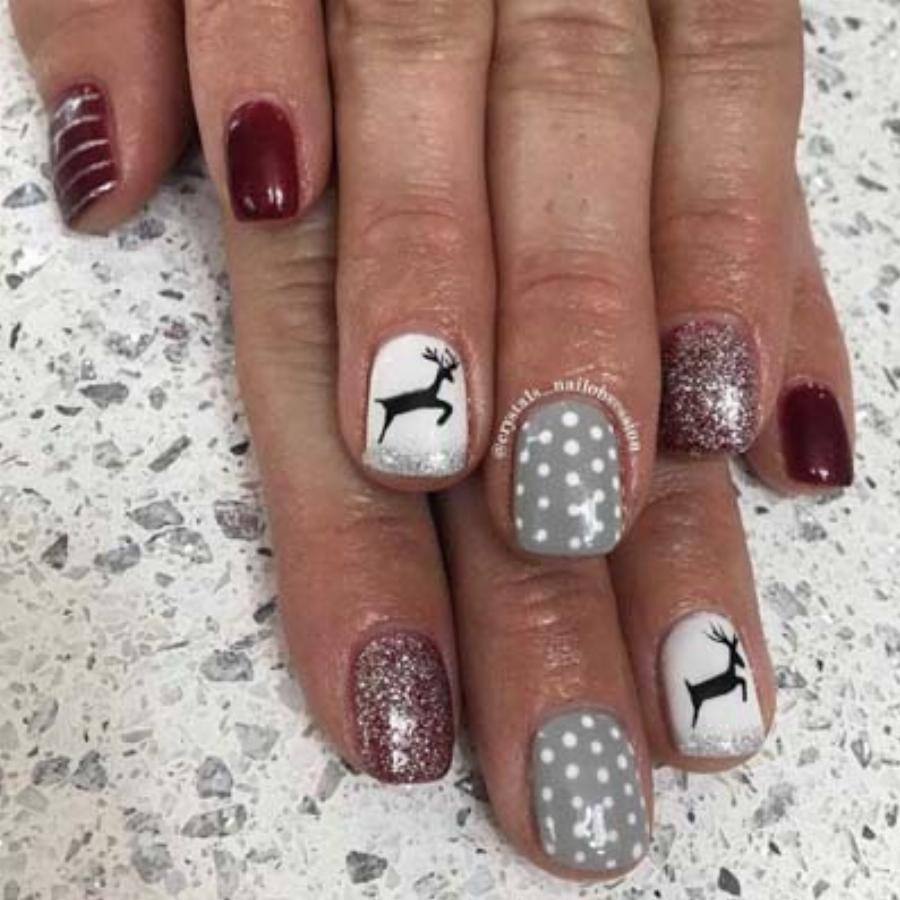 Υπέροχα γιορτινά σχέδια στα νύχια για τα Χριστούγεννα για να πάρετε ιδέες