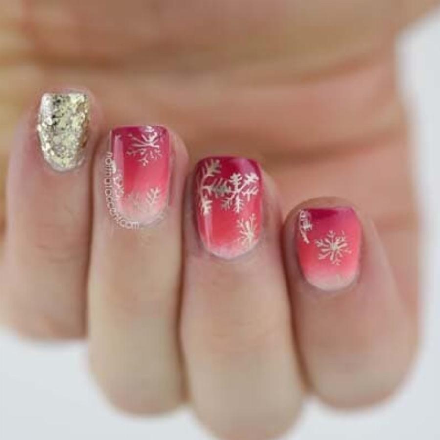 Υπέροχα γιορτινά σχέδια στα νύχια για τα Χριστούγεννα για να πάρετε ιδέες