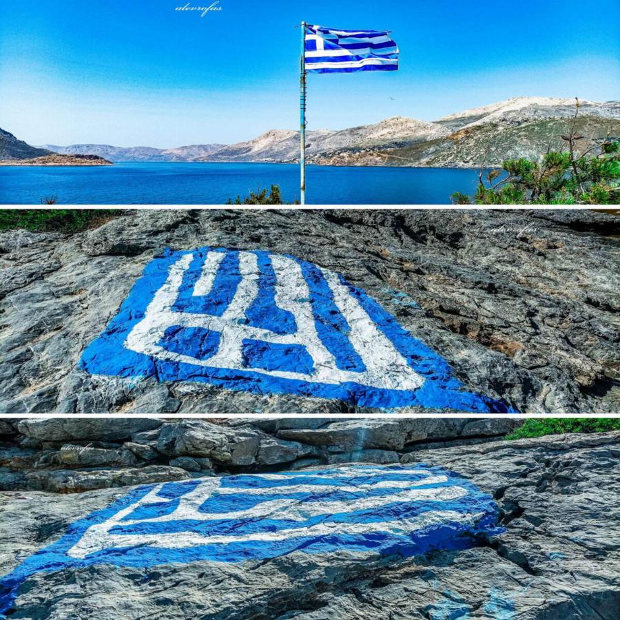 Αγία Κυριακή: Το εντυπωσιακό νησάκι και η γαλανόλευκη ζωγραφισμένη στα βράχια
