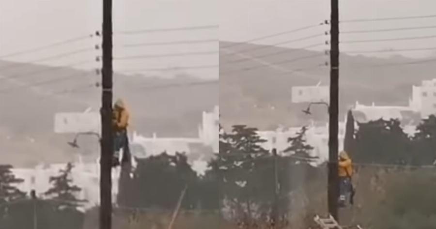 Πάρος: Κόβει την ανάσα το βίντεο με εναερίτη να κρέμεται από κολώνα την ώρα της κακοκαιρίας