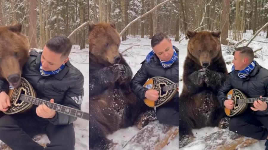 Viral Λαρισαίος: Άνδρας παίζει μπουζούκι στα χιόνια με μια αρκούδα να τον… λιγουρεύεται