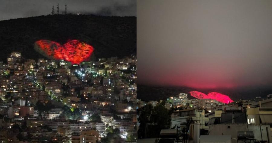 Μερακλής ο δήμαρχος Χαϊδαρίου: Μια πελώρια κόκκινη καρδιά φωτίζει το νταμάρι, στέλνοντας μήνυμα της αγάπης σε όλη την Αττική