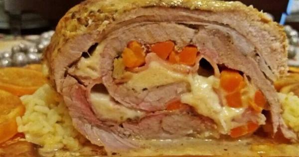 Χοιρινό ρολό γεμιστό: Ζουμερή συνταγή για γιορτινό τραπέζι